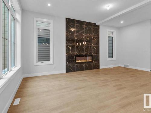 6722 Crawford Way, Edmonton, AB - Indoor Photo Showing Other Room With Fireplace