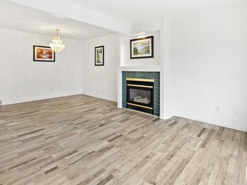 23 9630 176 Street, Edmonton, AB - Indoor Photo Showing Other Room With Fireplace