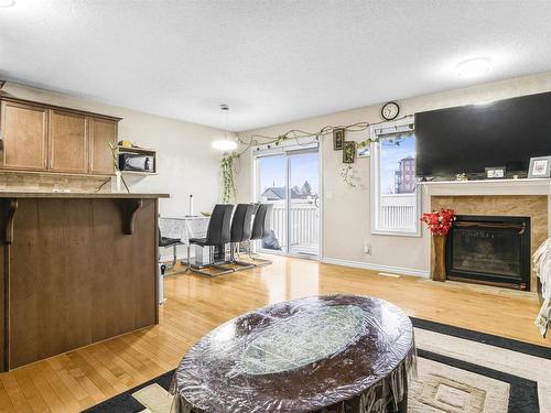 2631 29 Street, Edmonton, AB - Indoor Photo Showing Living Room With Fireplace