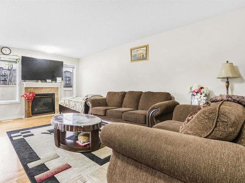 2631 29 Street, Edmonton, AB - Indoor Photo Showing Living Room With Fireplace