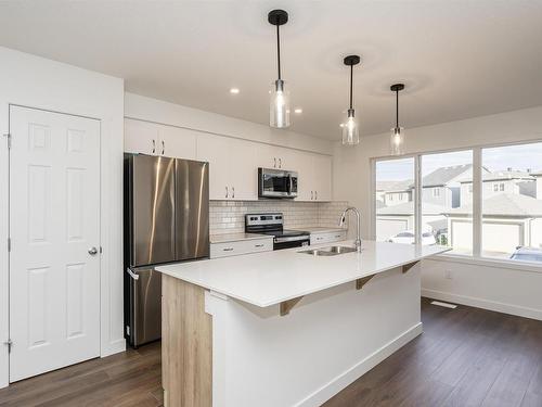 9554 Carson Bend, Edmonton, AB - Indoor Photo Showing Kitchen With Double Sink With Upgraded Kitchen