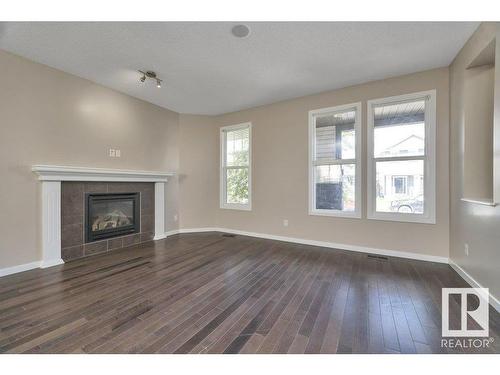 5921 168A Avenue, Edmonton, AB - Indoor Photo Showing Living Room With Fireplace