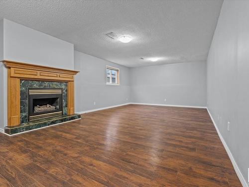 16 Heritage Crescent, Stony Plain, AB - Indoor With Fireplace