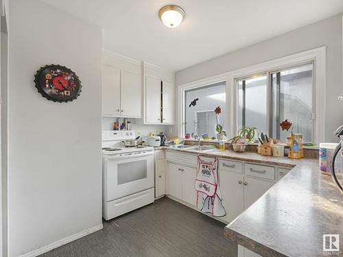 12703 107 Avenue, Edmonton, AB - Indoor Photo Showing Kitchen With Double Sink