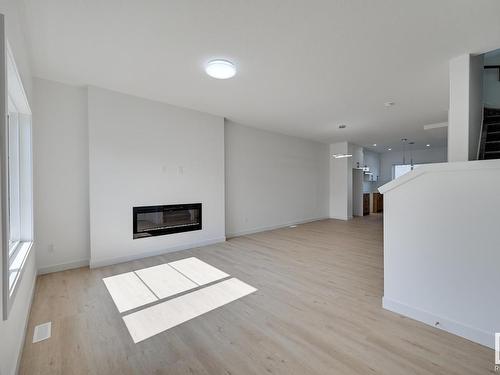 150 Castilian Boulevard, Sherwood Park, AB - Indoor Photo Showing Living Room With Fireplace