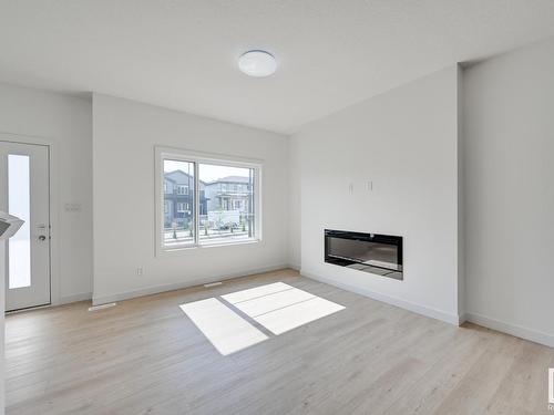 150 Castilian Boulevard, Sherwood Park, AB - Indoor Photo Showing Living Room With Fireplace