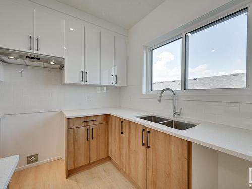 150 Castilian Boulevard, Sherwood Park, AB - Indoor Photo Showing Kitchen With Double Sink