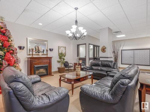 1608 10149 Saskatchewan Drive, Edmonton, AB - Indoor Photo Showing Living Room With Fireplace