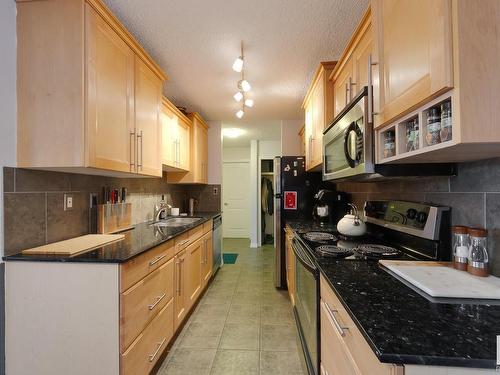 305 8215 83 Avenue, Edmonton, AB - Indoor Photo Showing Kitchen