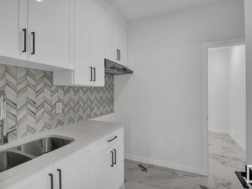 3903 41 Avenue, Beaumont, AB - Indoor Photo Showing Kitchen With Double Sink