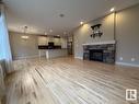 2309 Sparrow Crescent, Edmonton, AB  - Indoor Photo Showing Living Room With Fireplace 