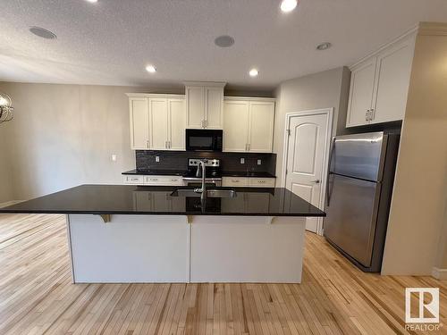 2309 Sparrow Crescent, Edmonton, AB - Indoor Photo Showing Kitchen With Double Sink