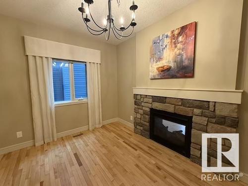 2309 Sparrow Crescent, Edmonton, AB - Indoor With Fireplace