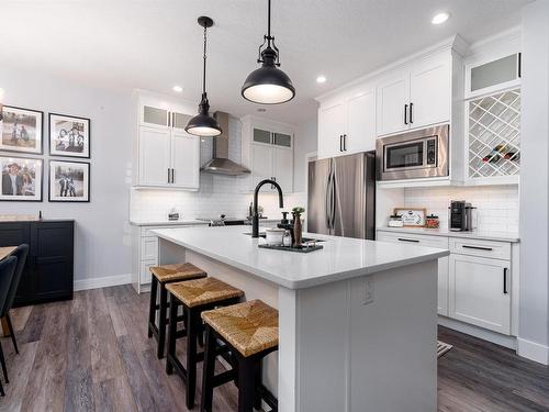 202 Woodhill Lane, Fort Saskatchewan, AB - Indoor Photo Showing Kitchen With Upgraded Kitchen