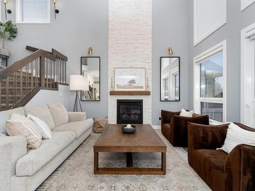 202 Woodhill Lane, Fort Saskatchewan, AB - Indoor Photo Showing Living Room With Fireplace