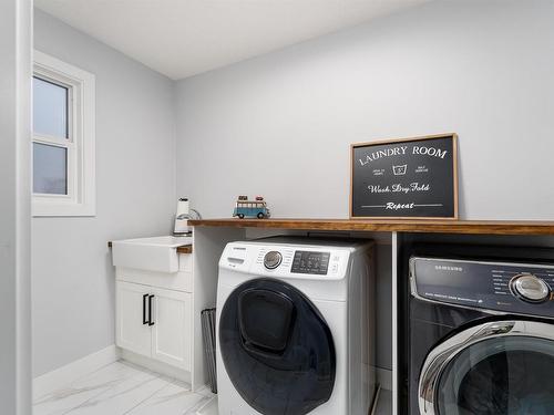 202 Woodhill Lane, Fort Saskatchewan, AB - Indoor Photo Showing Laundry Room