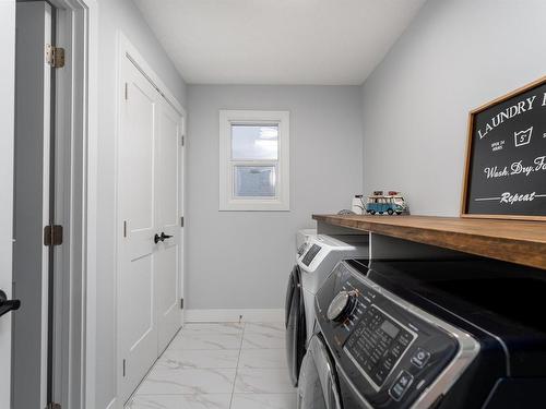 202 Woodhill Lane, Fort Saskatchewan, AB - Indoor Photo Showing Laundry Room