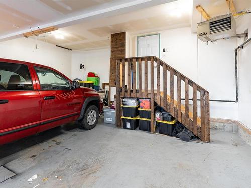 202 Woodhill Lane, Fort Saskatchewan, AB - Indoor Photo Showing Garage