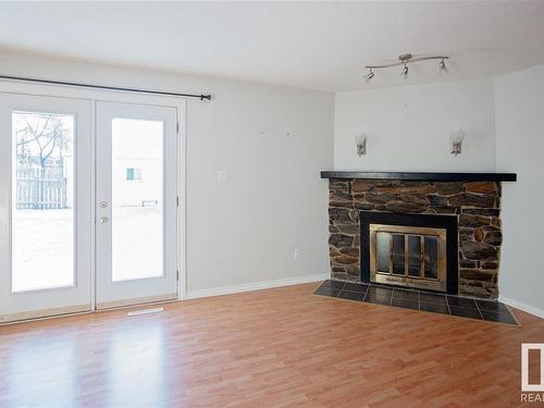 4802 52 Avenue, Bonnyville Town, AB - Indoor Photo Showing Living Room With Fireplace