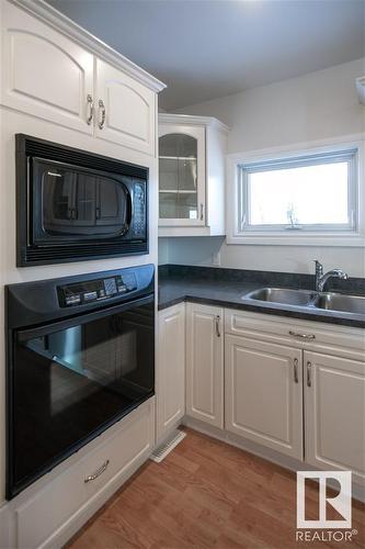 4802 52 Avenue, Bonnyville Town, AB - Indoor Photo Showing Kitchen With Double Sink