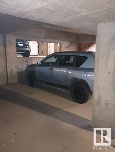 114 9010 106 Avenue, Edmonton, AB - Indoor Photo Showing Garage