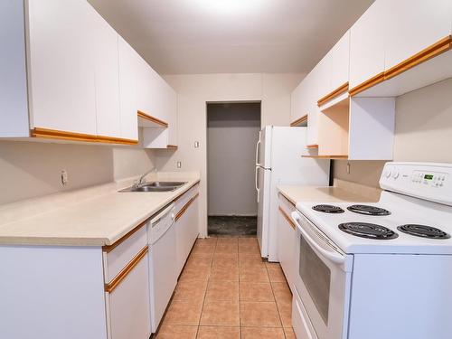 103 11831 106 Street, Edmonton, AB - Indoor Photo Showing Kitchen With Double Sink