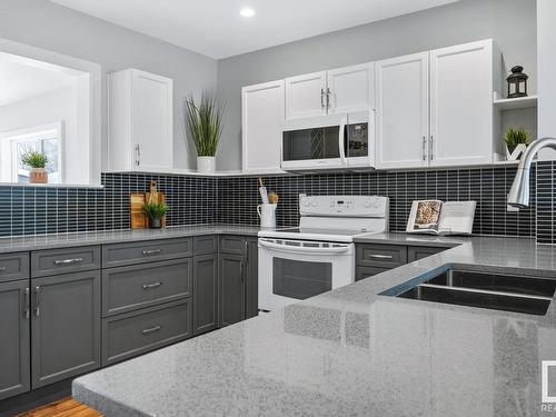 5709 52 Avenue, Cold Lake, AB - Indoor Photo Showing Kitchen With Double Sink