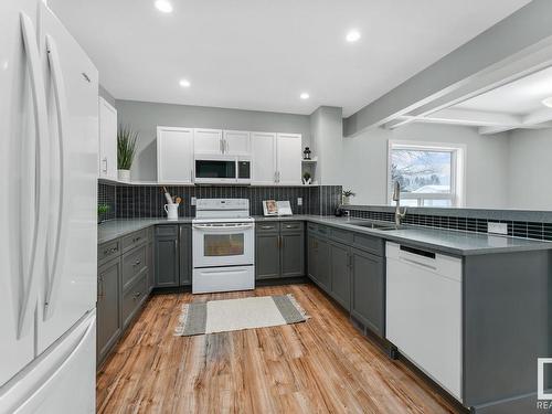 5709 52 Avenue, Cold Lake, AB - Indoor Photo Showing Kitchen With Double Sink