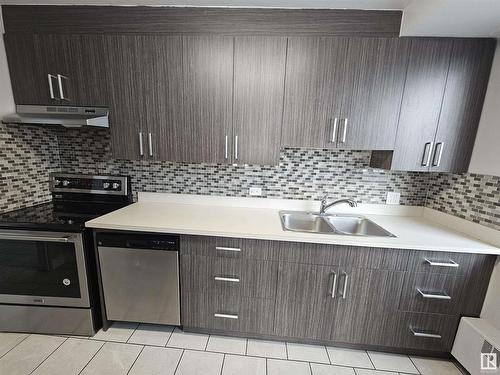 201 12207 Jasper Avenue, Edmonton, AB - Indoor Photo Showing Kitchen With Double Sink With Upgraded Kitchen