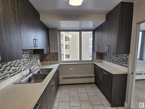 201 12207 Jasper Avenue, Edmonton, AB - Indoor Photo Showing Kitchen With Double Sink