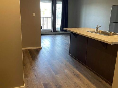 227 148 Ebbers Boulevard, Edmonton, AB - Indoor Photo Showing Kitchen With Double Sink