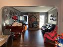 9624 75A Street, Edmonton, AB  - Indoor Photo Showing Living Room With Fireplace 