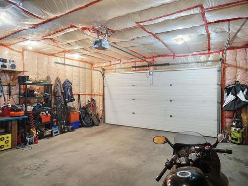 1445 Highwood Boulevard, Devon, AB - Indoor Photo Showing Garage