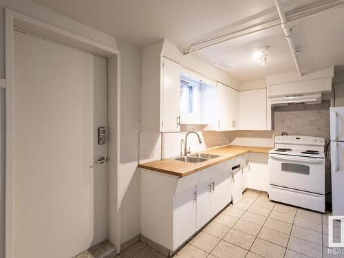 12747 128 Street, Edmonton, AB - Indoor Photo Showing Kitchen With Double Sink