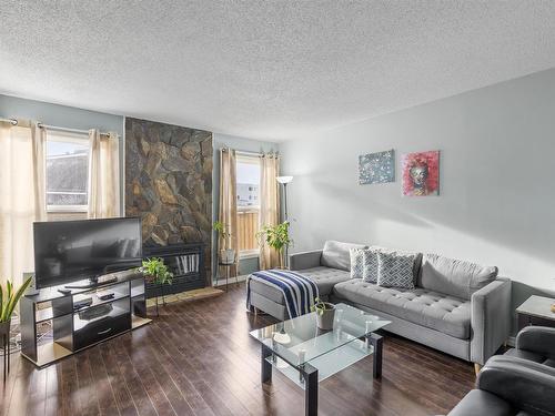 18415 66 Avenue, Edmonton, AB - Indoor Photo Showing Living Room With Fireplace