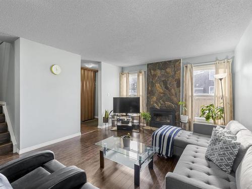 18415 66 Avenue, Edmonton, AB - Indoor Photo Showing Living Room With Fireplace