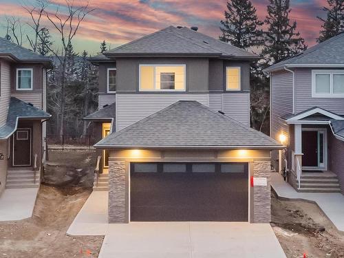 700 Astoria Way, Devon, AB - Outdoor With Facade