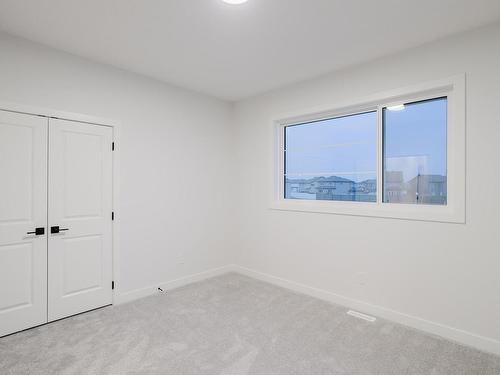 700 Astoria Way, Devon, AB - Indoor Photo Showing Other Room