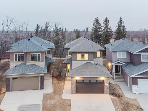 700 Astoria Way, Devon, AB - Outdoor With Facade