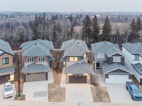 700 Astoria Way, Devon, AB - Outdoor With Facade