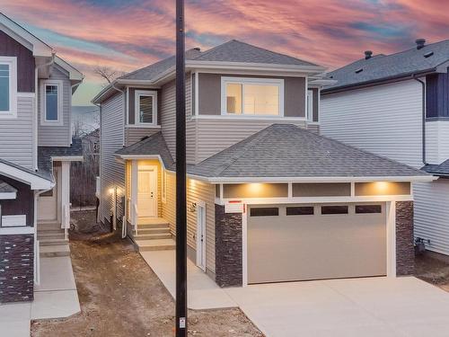 676 Astoria Way, Devon, AB - Outdoor With Facade