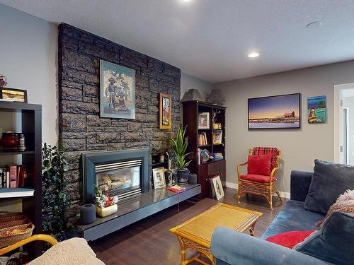 8611 Buena Vista Road, Edmonton, AB - Indoor Photo Showing Living Room With Fireplace