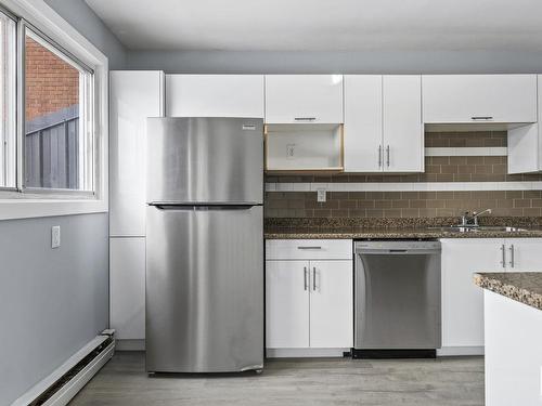 8 6135 98 Avenue, Edmonton, AB - Indoor Photo Showing Kitchen With Stainless Steel Kitchen With Double Sink