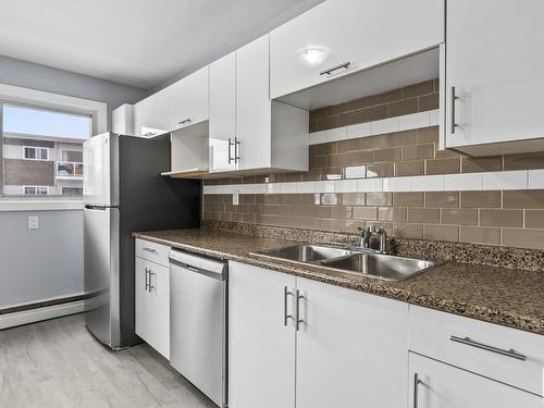 8 6135 98 Avenue, Edmonton, AB - Indoor Photo Showing Kitchen With Double Sink