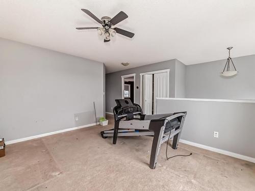 50 Acacia Link, Leduc, AB - Indoor Photo Showing Gym Room