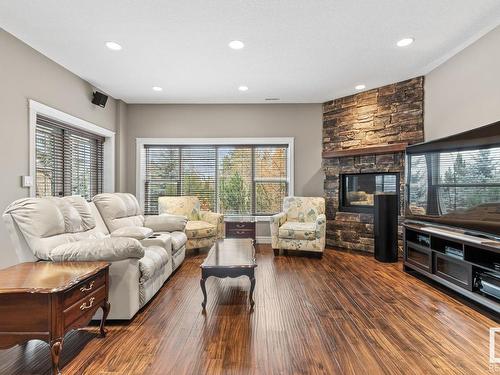 37 55312 Rge Road 241, Rural Sturgeon County, AB - Indoor Photo Showing Living Room With Fireplace