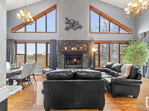 37 55312 Rge Road 241, Rural Sturgeon County, AB - Indoor Photo Showing Living Room With Fireplace