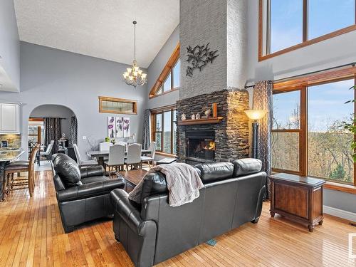 37 55312 Rge Road 241, Rural Sturgeon County, AB - Indoor Photo Showing Living Room With Fireplace