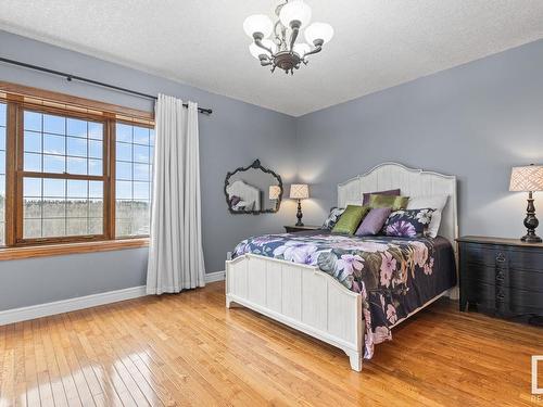 37 55312 Rge Road 241, Rural Sturgeon County, AB - Indoor Photo Showing Bedroom