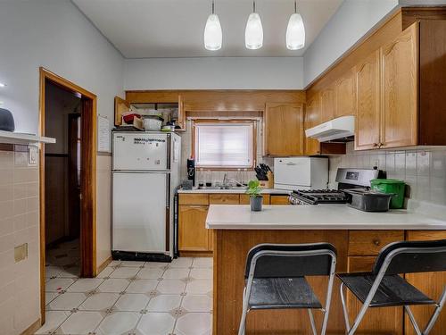 9531 109A Avenue, Edmonton, AB - Indoor Photo Showing Kitchen With Double Sink